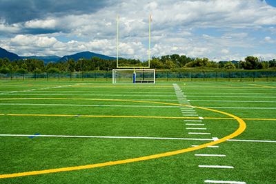 Artificial turf field, showing goalposts and marking lines